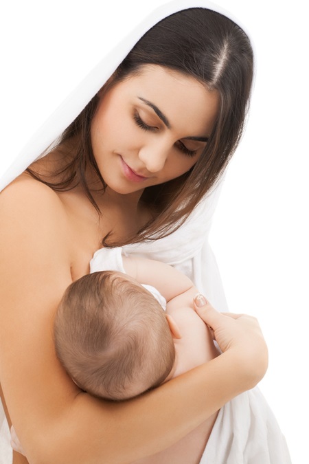 family, parenting and child care concept - happy mother feeding her adorable baby