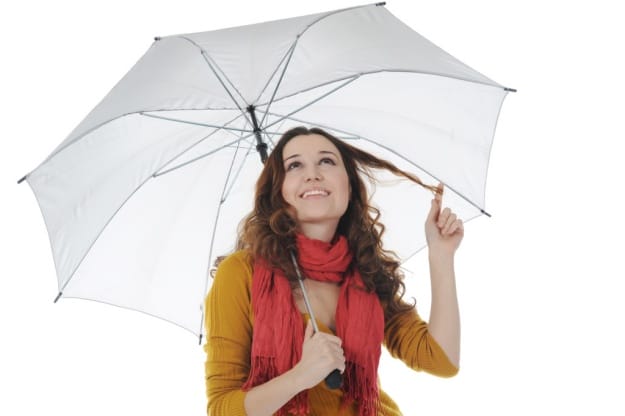 Image of a businessman with umbrella