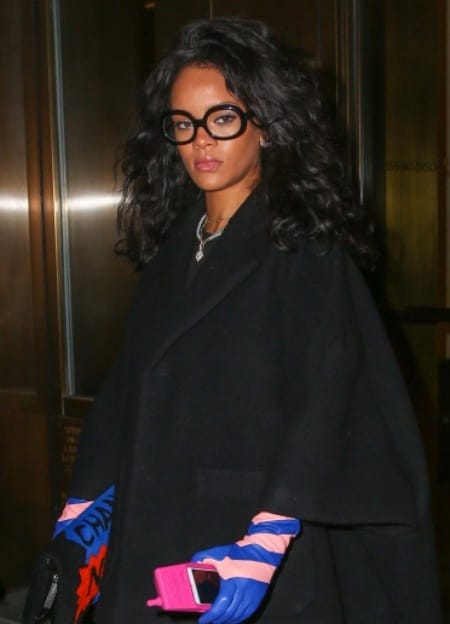 Rihanna Wears Colorful Leather Gloves & Carries A Chanel Purse