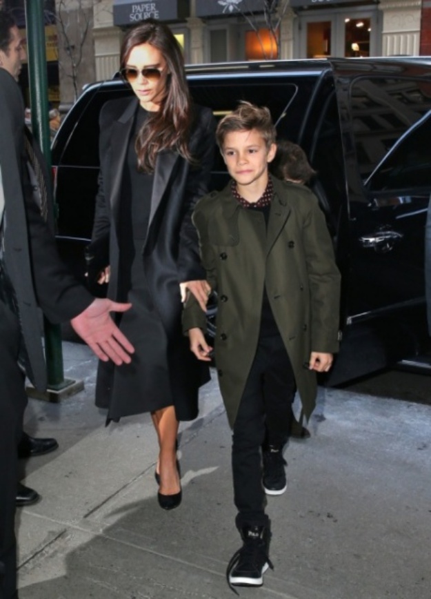 ©NATIONAL PHOTO GROUP David Beckham carries Harper followed by sons Romeo, Brooklyn, Cruz Beckham and wife Victoria out of Balthazar restaurant in NYC. Job: 020914J3 Non-Exclusive Feb. 9th 2014 New York, NY NPG.com
