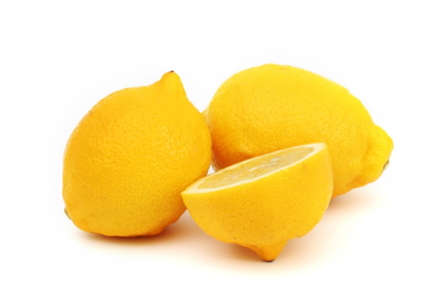 yellow lemons slice pile isolated on white