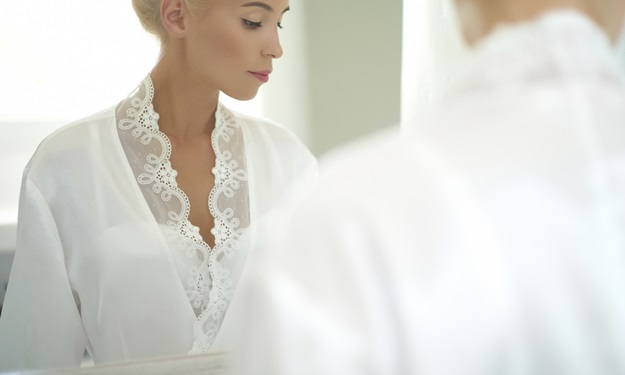Beautiful bride in the mirror. Fashion art photo
