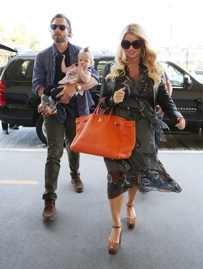 3 May 2013 - LOS ANGELES - USA PREGNANT JESSICA SIMPSON AND HER BOYFRIEND ERIC JOHNSON DEPARTS FROM LAX WITH THERE DAUGHTER MAXWELL DREW JOHNSON BYLINE MUST READ : RIOS / XPOSUREPHOTOS.COM ***UK CLIENTS - PICTURES CONTAINING CHILDREN PLEASE PIXELATE FACE PRIOR TO PUBLICATION *** **UK AND USA CLIENTS MUST CALL PRIOR TO TV OR ONLINE USAGE PLEASE TELEPHONE 44 208 370 0291 or 1 310 600 4723