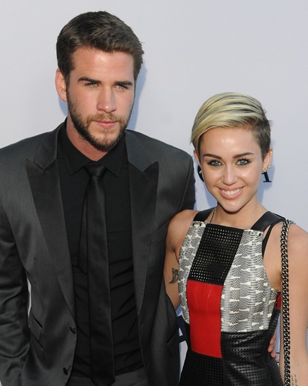*** MILEY CYRUS AND LIAM HEMSWORTH END ENGAGEMENT MILEY CYRUS and LIAM HEMSWORTH have called off their engagement. The former Hannah Montana star's representative has confirmed the sad news to E!, explaining the couple has ended its almost four-year relationship. According to sources, Cyrus broke things off "after coming to grips with Liam being what she believed was less than faithful to her (sic)." Hemsworth and Cyrus met and fell in love while filming The Last Song in 2009. After briefly splitting in 2010, the couple reunited and became engaged in 2012. Last week (ends15Sep13), rumours resurfaced about a romance between Hemsworth and January Jones, but his representative denied the reports calling them "tabloid fiction." On Saturday (14Sep13), Cyrus stopped following The Hunger Games star on Twitter.com. The couple was last spotted together last month (Aug13) at the Los Angeles premiere of Hemsworth's movie Paranoia. (KG/WNWE/KL)** Red Carpet Arrivals for the US premiere of PARANOIA Featuring: Liam Hemsworth, Miley Cyrus Where: LA, CA, United States When: 08 Aug 2013 Credit: Daniel Tanner/WENN.com