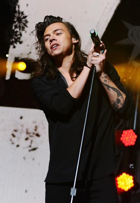 , Dallas, TX - 12/01/15 - 2015 iHeart Radio Jingle Ball - Dallas - Show -PICTURED: Harry Styles, (of One Direction) -PHOTO by: Vince Flores/startraksphoto.com -VIF54934 Editorial - Rights Managed Image - Please contact www.startraksphoto.com for licensing fee Startraks Photo New York, NY Image may not be published in any way that is or might be deemed defamatory, libelous, pornographic, or obscene. Please consult our sales department for any clarification or question you may have. Startraks Photo reserves the right to pursue unauthorized users of this image. If you violate our intellectual property you may be liable for actual damages, loss of income, and profits you derive from the use of this image, and where appropriate, the cost of collection and/or statutory damages.