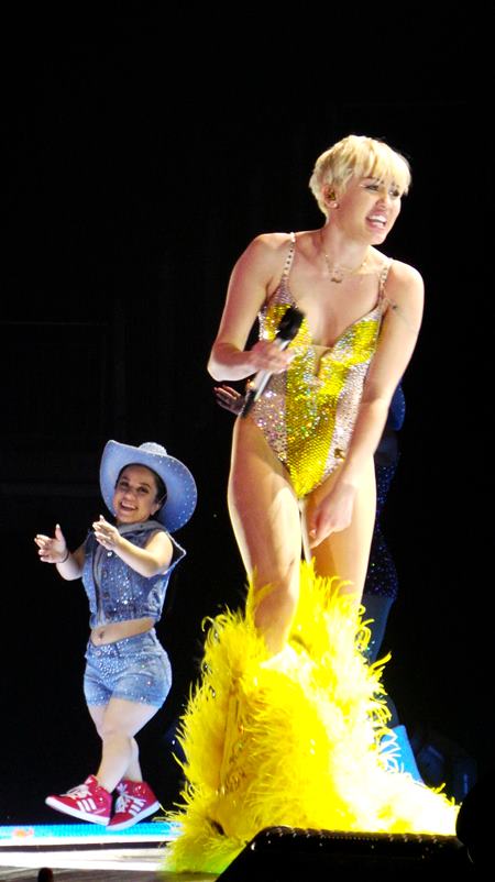 Miley Cyrus opens her Bangerz tour with some dramas as she becomes trapped in costumes and even has her mum Tish on stage to help. Featuring: Miley Cyrus Where: London, United Kingdom When: 06 May 2014 Credit: David Sims/WENN.com