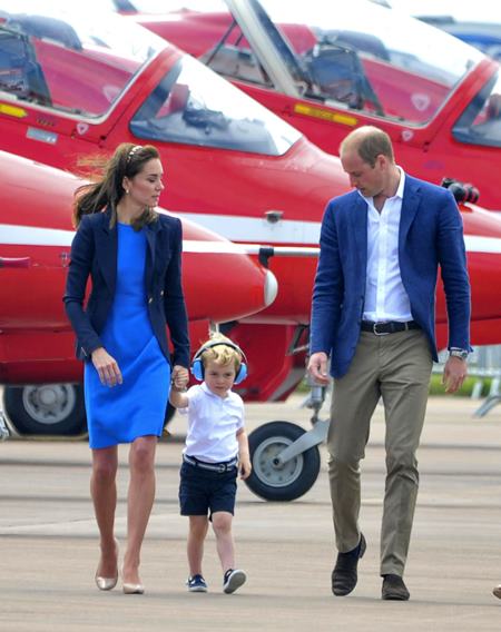 The Duke and Duchess of Cambridge Prince William and Kate along with Prince George attend the Royal International Air tattoo at RAF Fairford, Gloucestershire