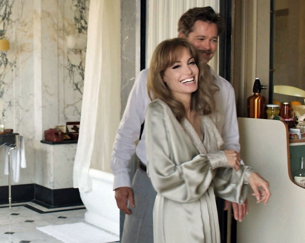 USA. Brad Pitt and Angelina Jolie on the set of the ©Universal Pictures new film: By the Sea (2015). Plot: Set in France during the mid-1970s, Vanessa, a former dancer, and her husband Roland, an American writer, travel the country together. They seem to be growing apart, but when they linger in one quiet, seaside town they begin to draw close to some of its more vibrant inhabitants, such as a local bar keeper and a hotel owner. Ref:LMK106-58453-050116 Supplied by LMKMEDIA. Editorial Only. Landmark Media is not the copyright owner of these Film or TV stills but provides a service only for recognised Media outlets. pictures@lmkmedia.com