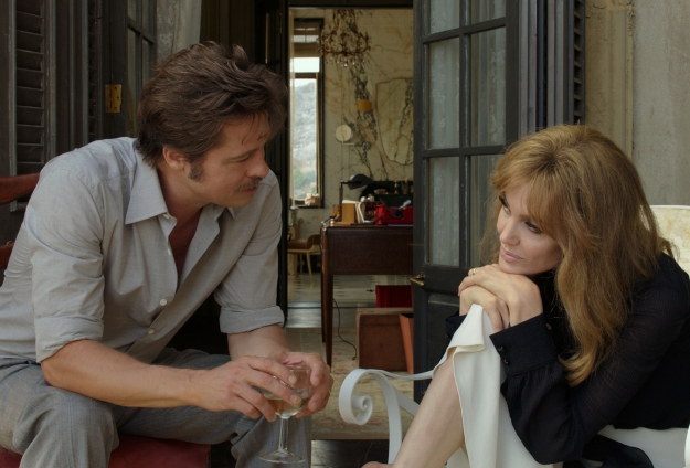USA. Brad Pitt and Angelina Jolie on the set of the ©Universal Pictures new film: By the Sea (2015). Plot: Set in France during the mid-1970s, Vanessa, a former dancer, and her husband Roland, an American writer, travel the country together. They seem to be growing apart, but when they linger in one quiet, seaside town they begin to draw close to some of its more vibrant inhabitants, such as a local bar keeper and a hotel owner. Ref:LMK106-58453-050116 Supplied by LMKMEDIA. Editorial Only. Landmark Media is not the copyright owner of these Film or TV stills but provides a service only for recognised Media outlets. pictures@lmkmedia.com
