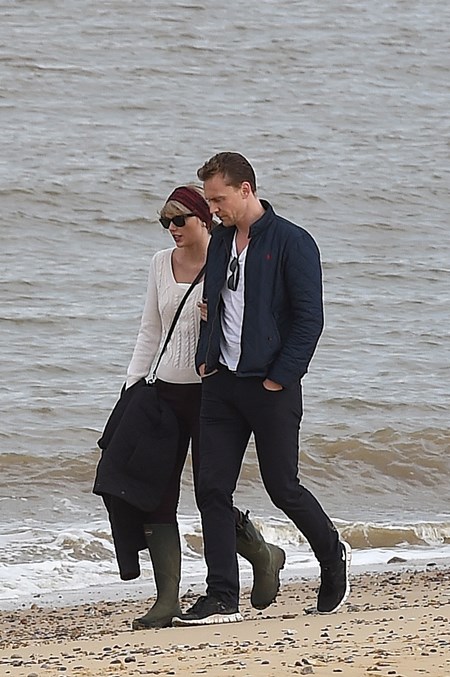 Taylor Swift and new boyfriend Tom Hiddleston enjoy a romantic walk on the beach near Lowestoft in Suffolk. They were joined by Tom's mother and some other friends. After around 2 hours they returned to their cars, and were given a Police escort back towards their house Featuring: Taylor Swift, Tom Hiddleston Where: London, United Kingdom When: 26 Jun 2016 Credit: Will Alexander/WENN.com