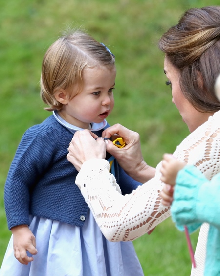 Mandatory Credit: Photo by REX/Shutterstock (6047574d) Catherine, Duchess of Cambridge and Princess Charlotte of Cambridge at a children's party for Military families The Duke and Duchess of Cambridge visit Canada - 29 Sep 2016 Prince William, Duke of Cambridge, Catherine, Duchess of Cambridge, Prince George and Princess Charlotte are visiting Canada as part of an eight day visit to the country taking in areas such as Bella Bella, Whitehorse and Kelowna