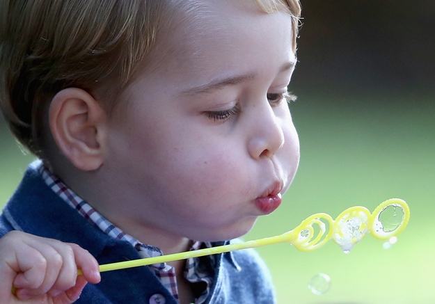 Mandatory Credit: Photo by Tim Rooke/REX/Shutterstock (6047583b) Prince George of Cambridge plays with bubbles at a children's party for Military families during the Royal Tour of Canada. The Duke and Duchess of Cambridge visit Canada - 29 Sep 2016 Prince William, Duke of Cambridge, Catherine, Duchess of Cambridge, Prince George and Princess Charlotte are visiting Canada as part of an eight day visit to the country taking in areas such as Bella Bella, Whitehorse and Kelowna