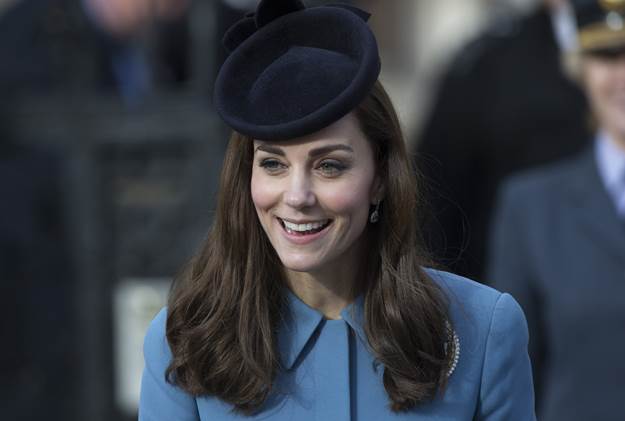 Britain's Catherine, Duchess of Cambridge leaves a reception after attending an event to mark the 75th anniversary of the RAF Air Cadets, at The Royal Courts of Judtice in London, Britain February 7, 2016. REUTERS/Neil Hall - RTX25U73